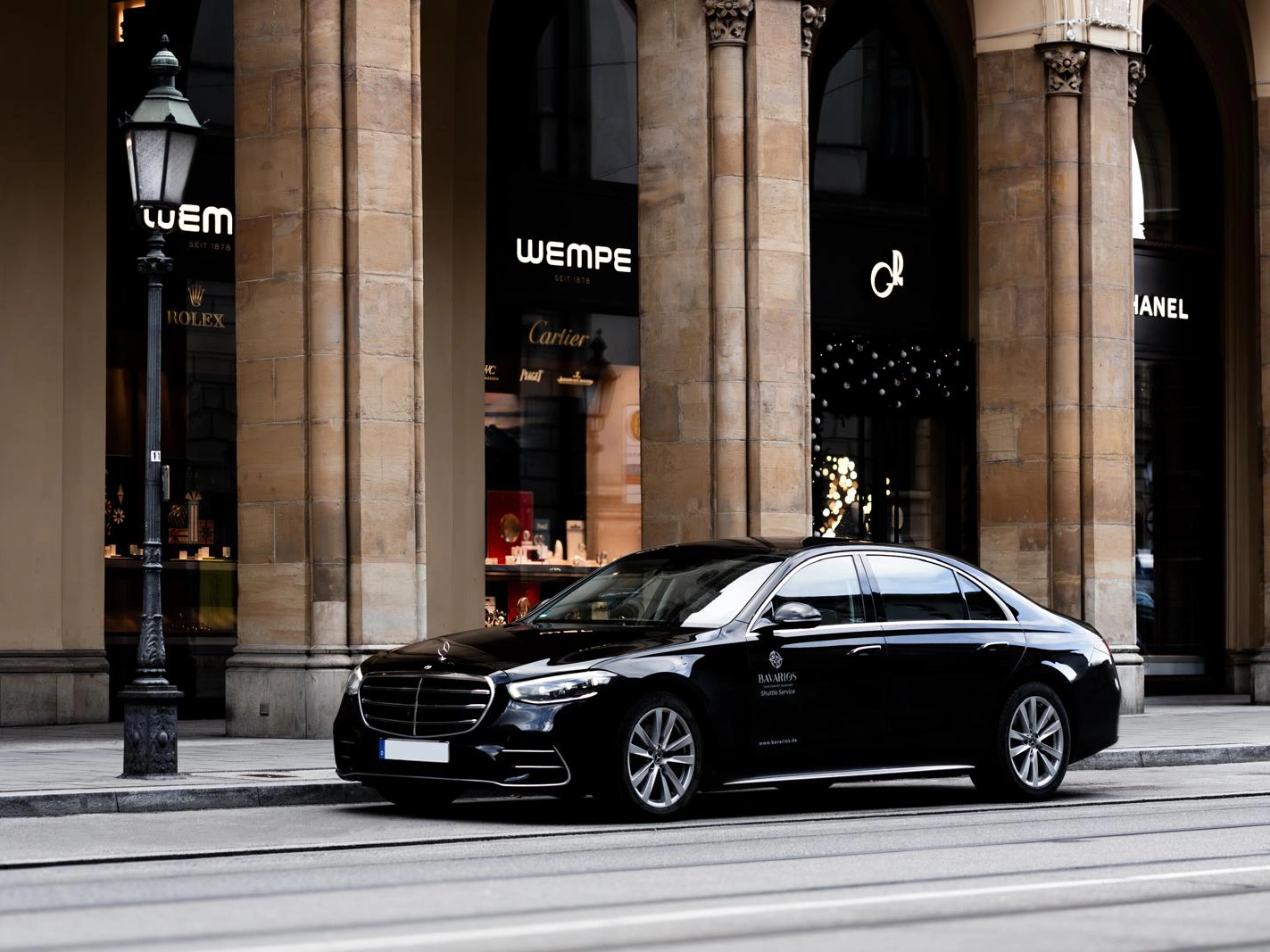 Bavarios chauffeur vehicles in a premium editorial hero scene